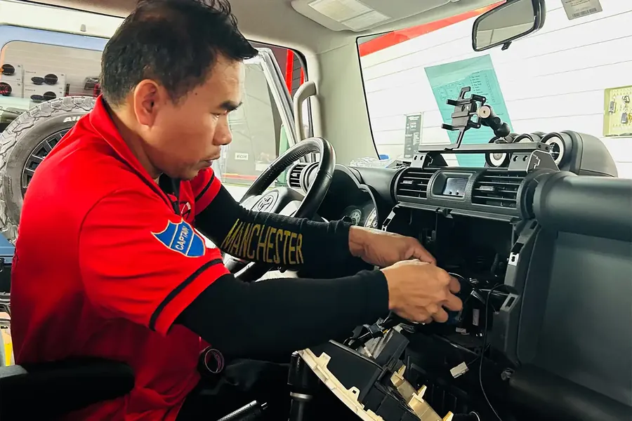 Head unit installation by a technician